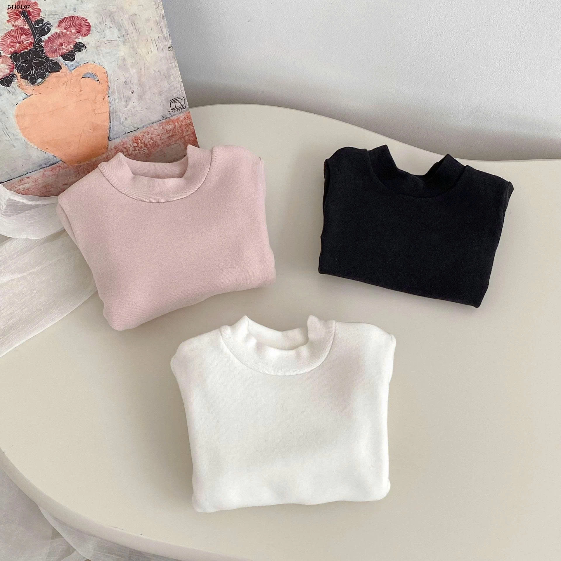 Áo giữ nhiệt mùa đông 2025 cho trẻ em màu trơn, cổ tròn- giá sỉ 140k