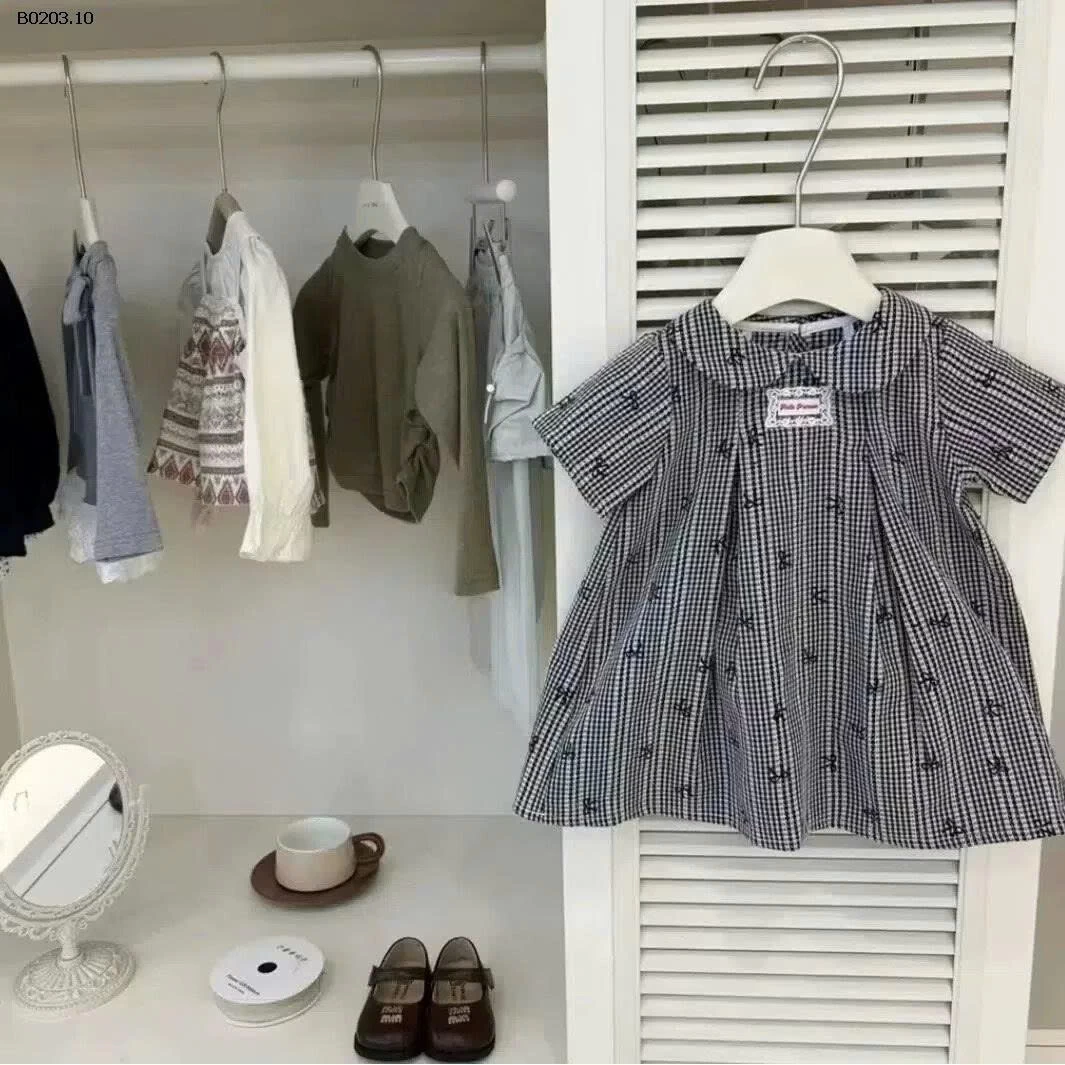 VÁY KẺ CARO HỌA TIẾT NƠ BG- sỉ 139k